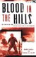 Blood in the Hills - The Story of Khe Sanh, the Most Savage Fight of the Vietnam War (Paperback): Robert Maras, Charles W Sasser